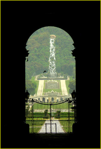 28 Gardens of Palazzo Reale seen through entrance gate, Caserta near Napoli 